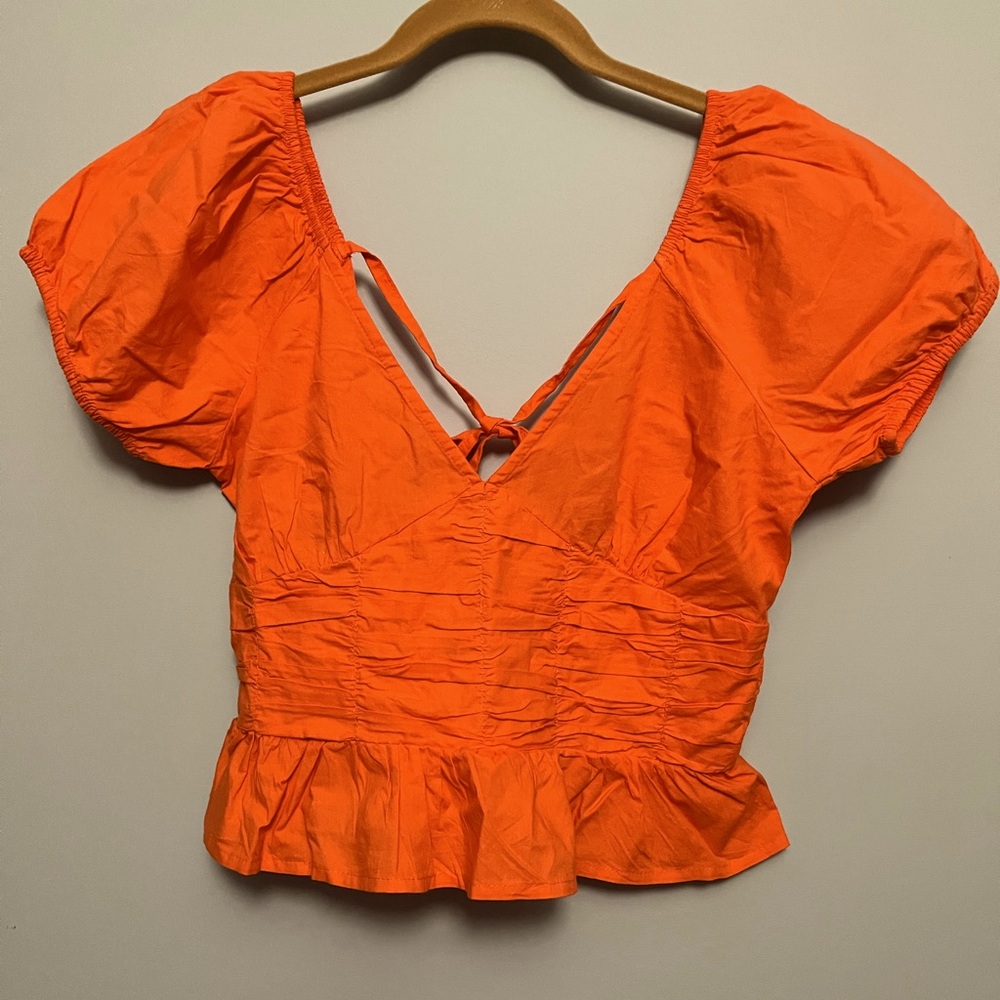 Sim & Sam cut orange top with open back